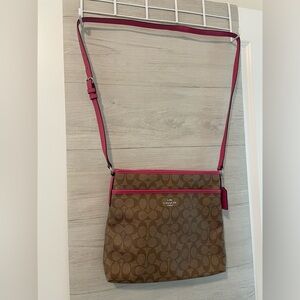 Coach crossbody. Great for traveling, shopping, etc. Used a few times.